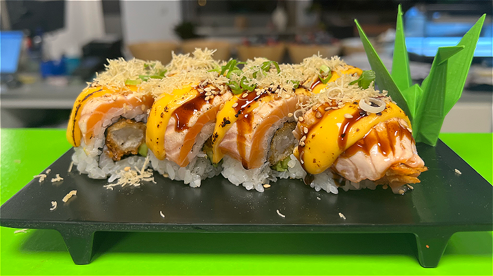 Flamed Sake Cheese Dragon roll