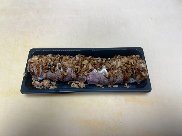 Flamed beef roll