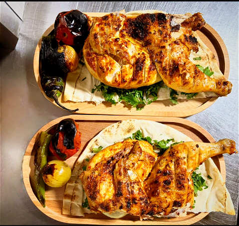 Gegrilde hele Kip op houtskool