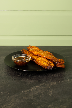 Bakbanana met saus + €0,25