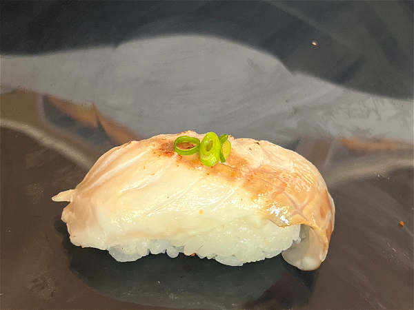 Flamed suzuki nigiri