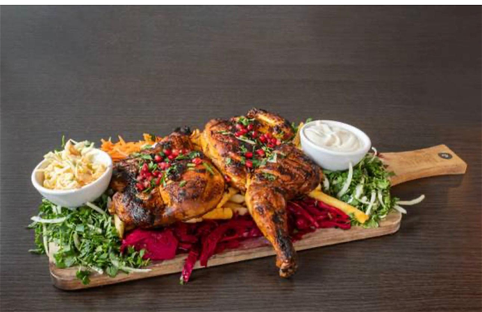 Hele kip op houtskool