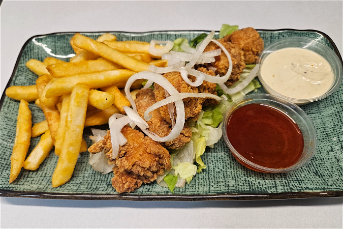 Hot & spicy chicken met portie friet