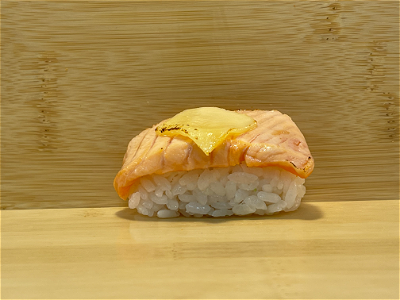 Flamed sake cheese nigiri
